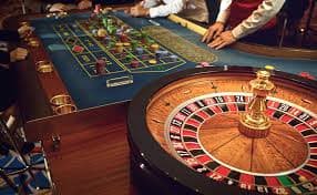 Live Baccarat dealer studio with multiple camera angles and live card deal